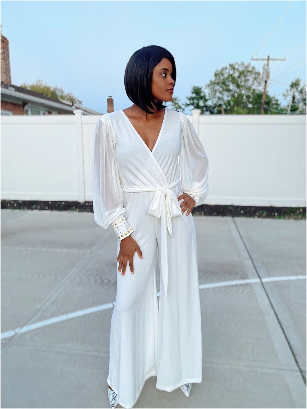Elegant White Wrap Jumpsuit with Sheer Bishop Sleeves